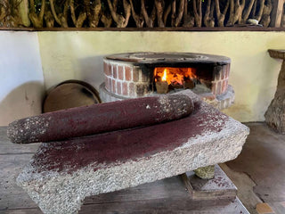 traditionally grinding cacao